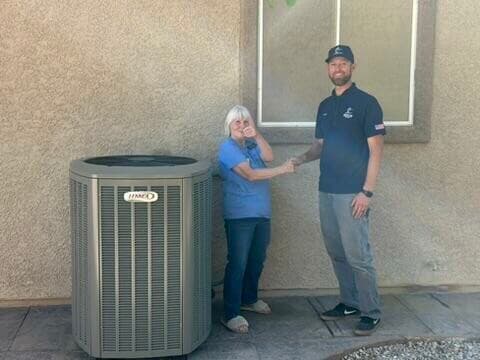 Marlin technician shaking hands with a satisfied homeowner